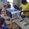 Shelton High School student teaches intro to robotics